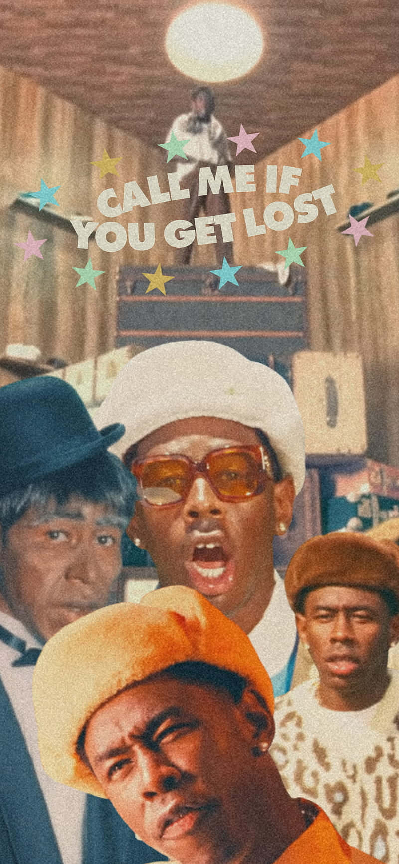 Tyler The Creator displayed behind a desktop, with a polaroid photo and headphones Wallpaper
