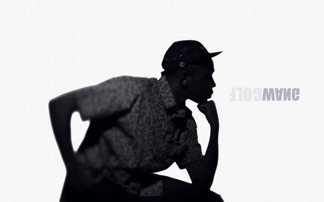 Tyler The Creator in thoughtful contemplation Wallpaper
