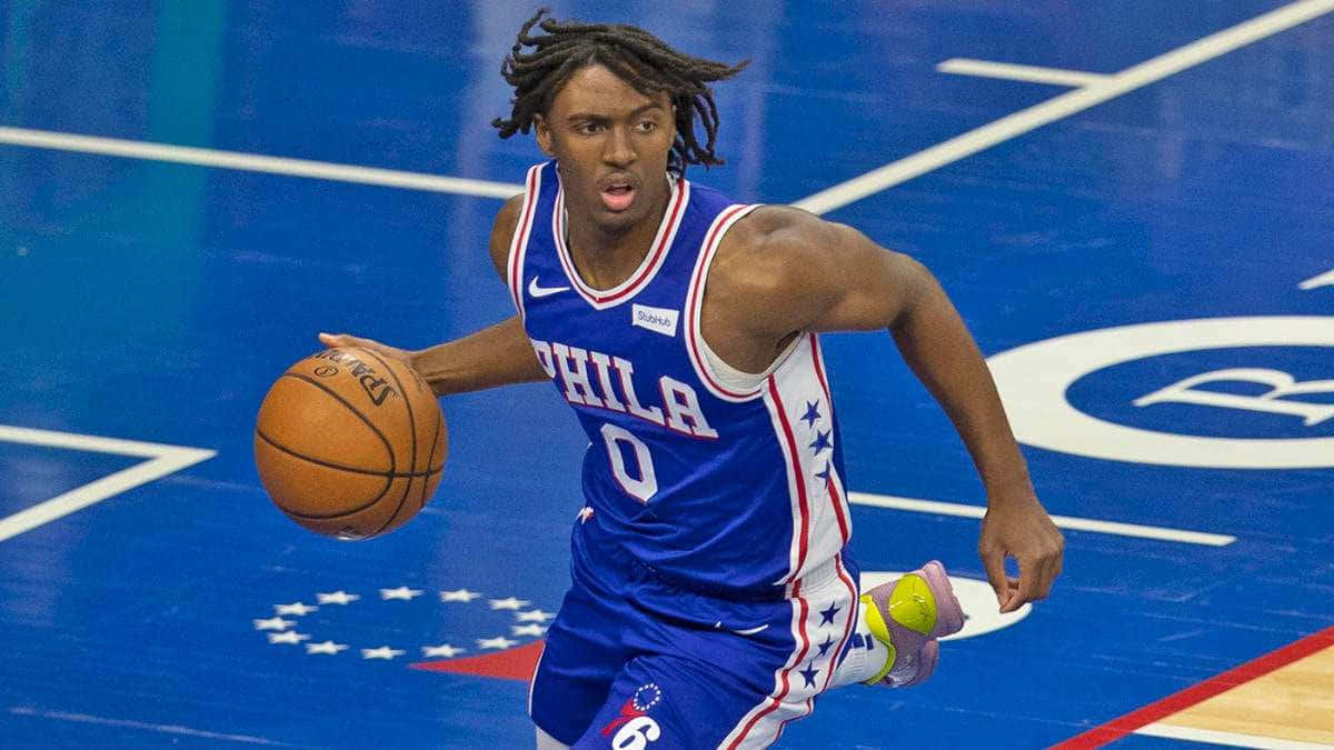 Tyrese Maxey Philadelphia 76ers Actiefoto Achtergrond