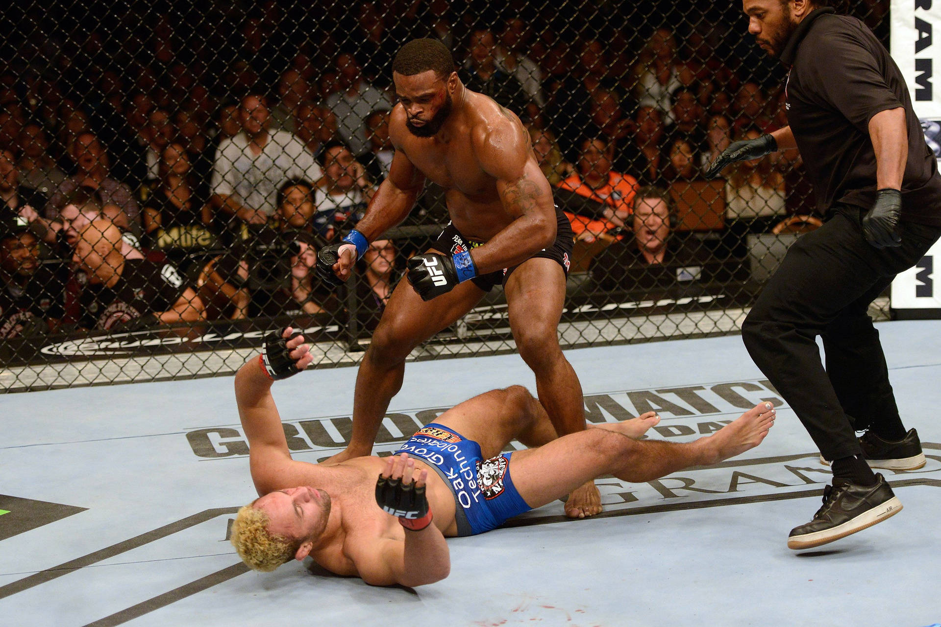 Tyron Woodley Defeating Opponent Wallpaper
