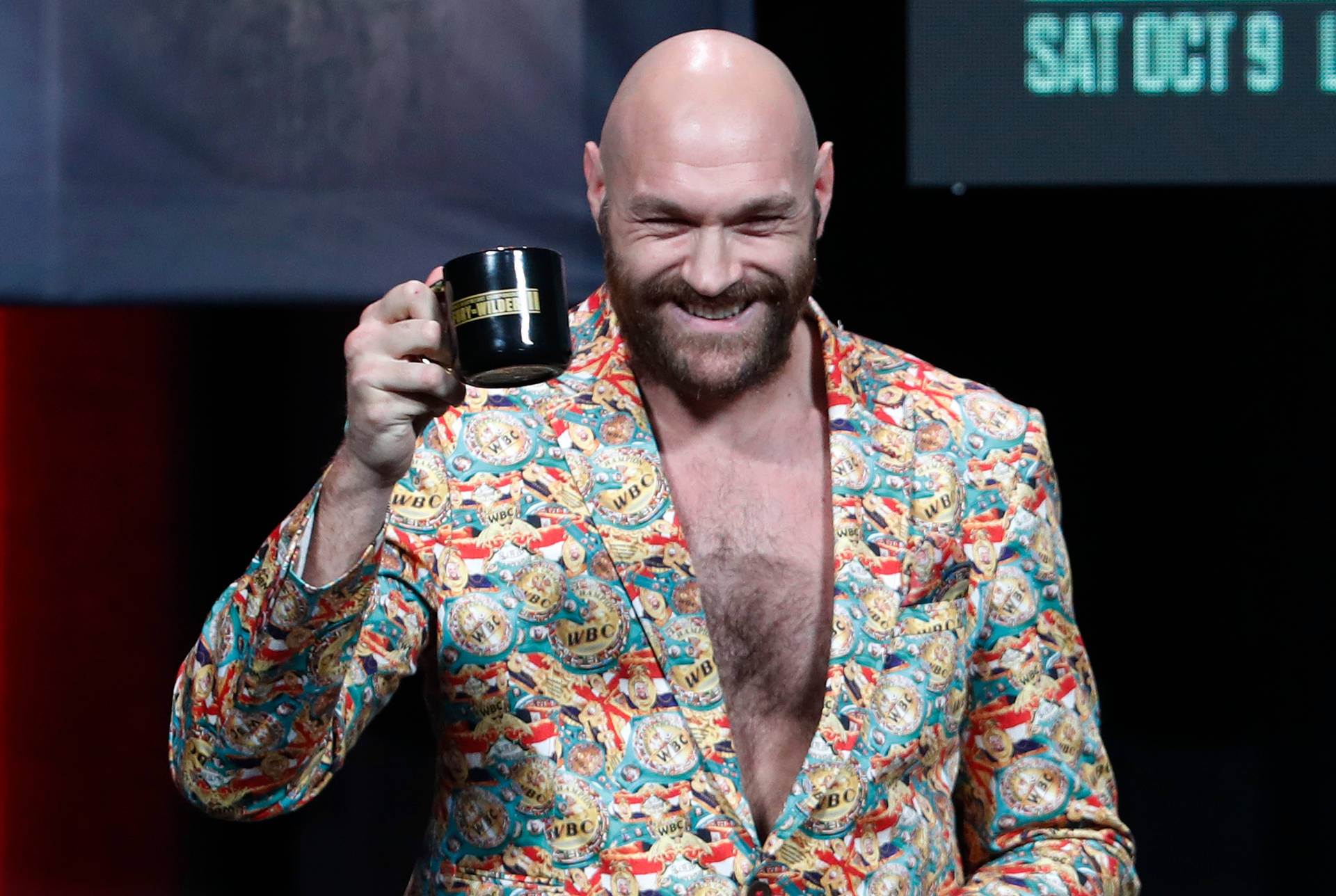 Tyson Fury Cheers Using Cup Of Coffee Wallpaper