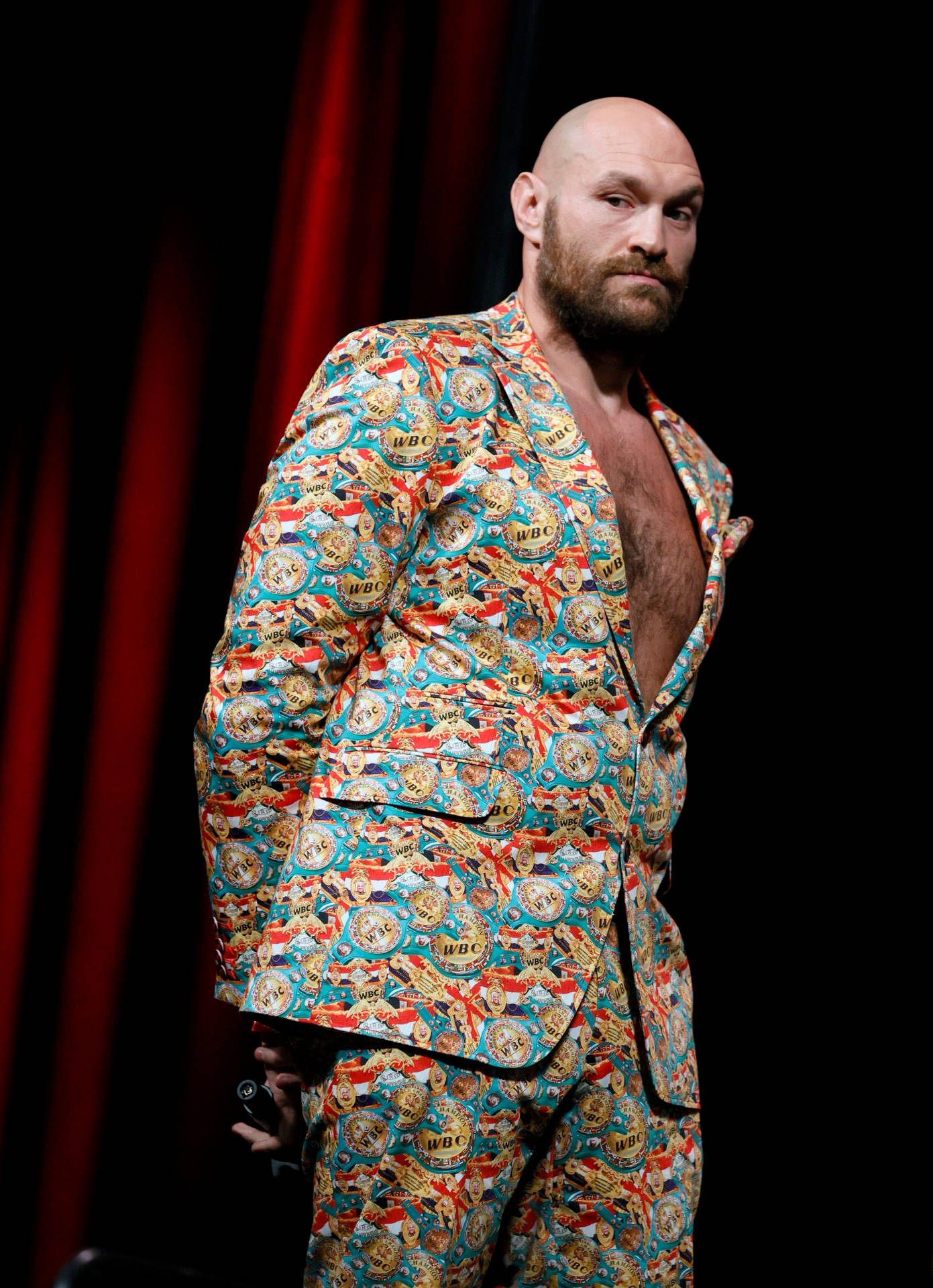 Tyson Fury Grinning Face In Formal Suit Wallpaper
