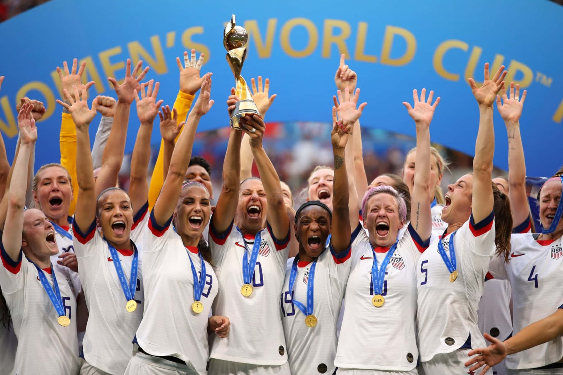 U S Womens Soccer Team Celebrating World Cup Victory Wallpaper