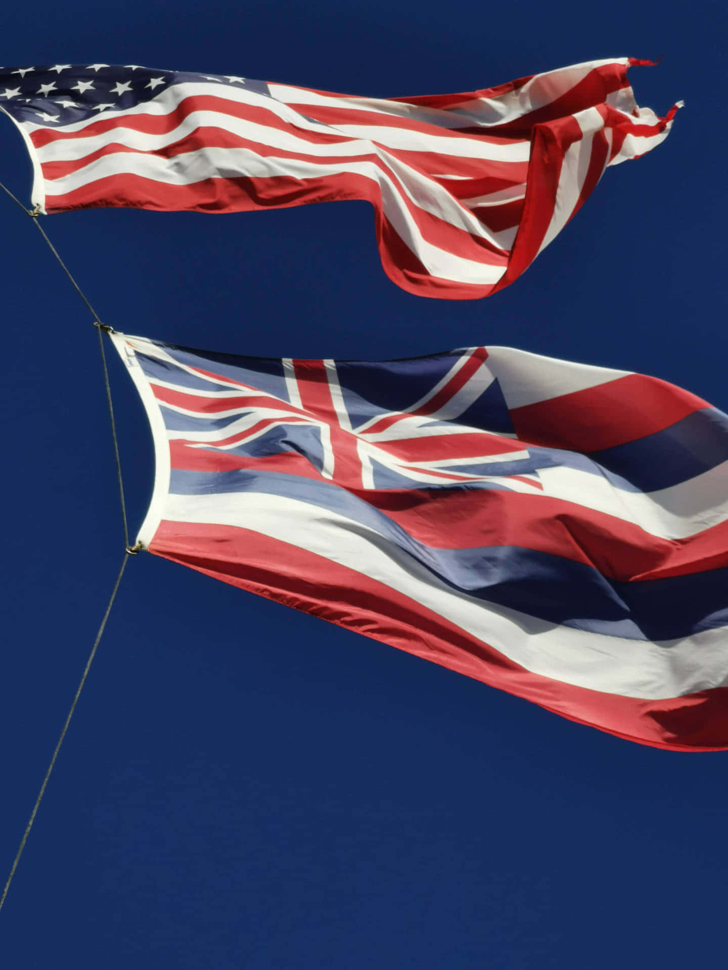 U Sand U K Flags Waving Against Blue Sky Wallpaper