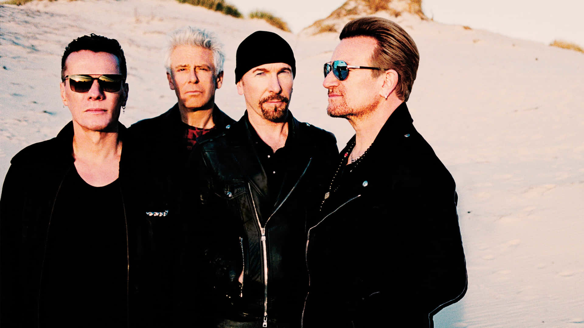 U2 Bandleden Strandportret Achtergrond