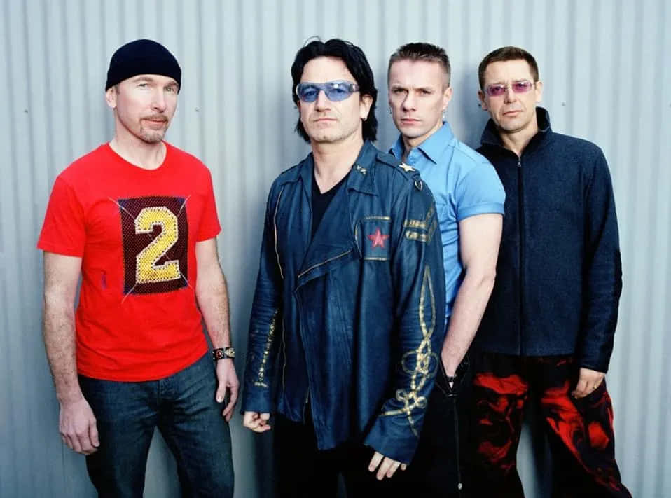 Download U2 Band Members Group Photo Wallpaper | Wallpapers.com