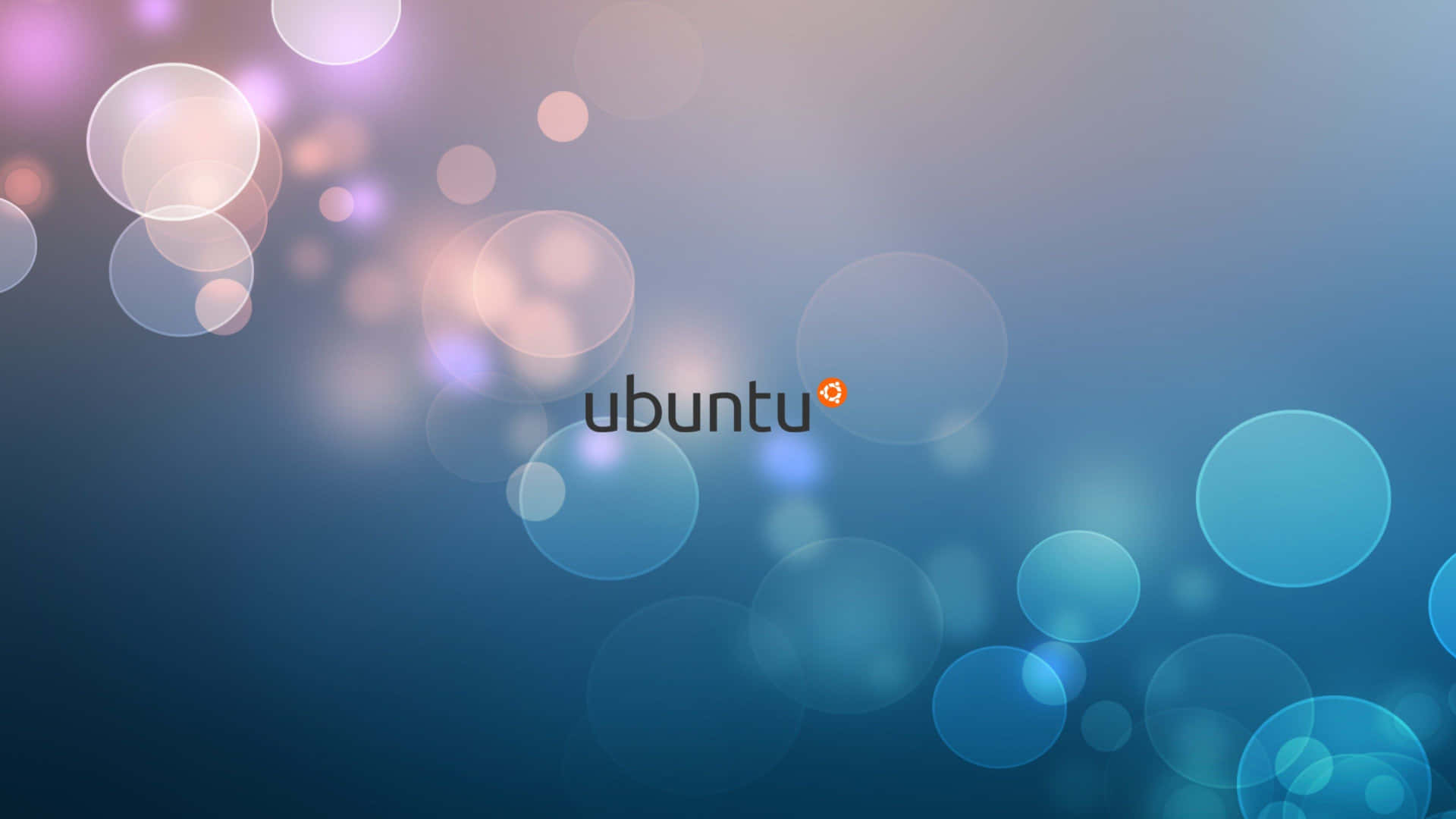 En blå baggrund med ordet ubuntu skrevet over det. Wallpaper