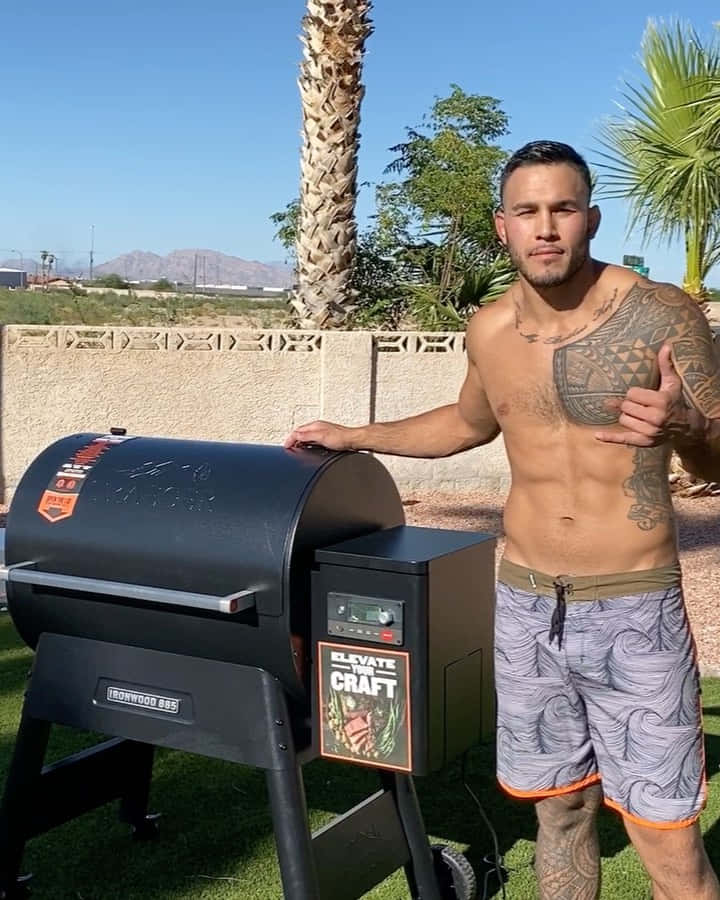 UFC Fighter Brad Tavares Beside The Grill Wallpaper