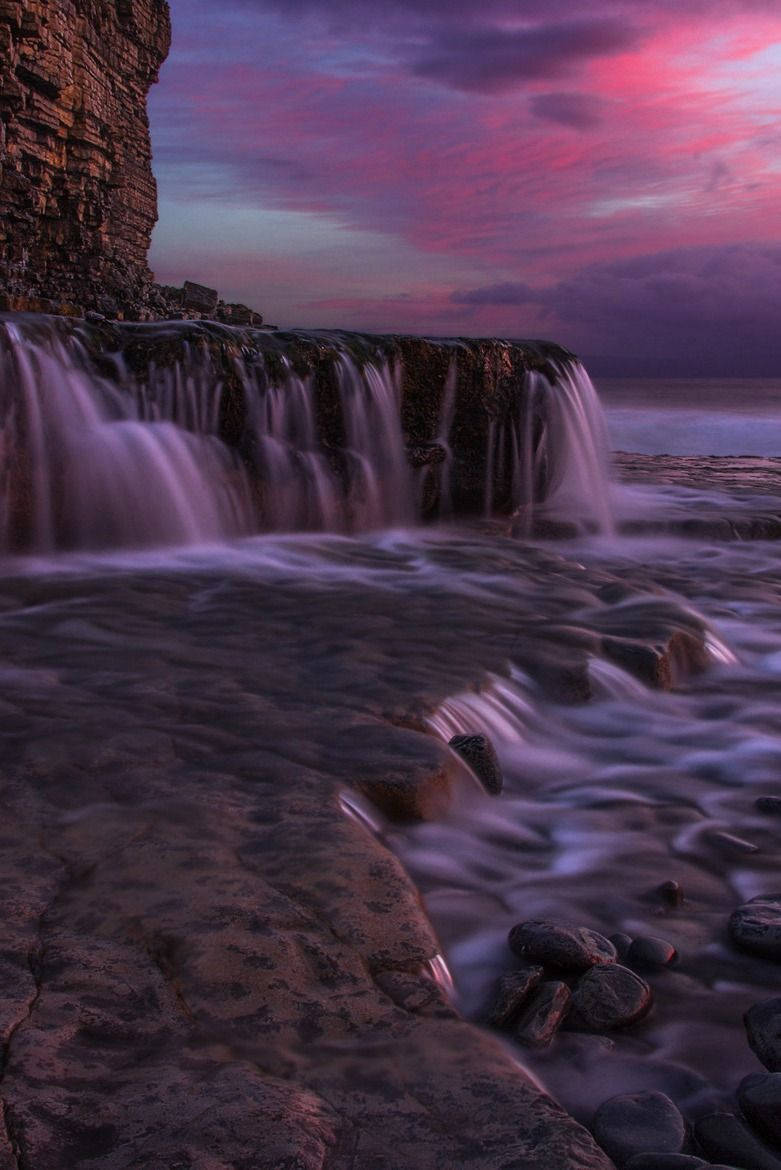 Cliff Cape's Purple Sunset Från Storbritannien Wallpaper