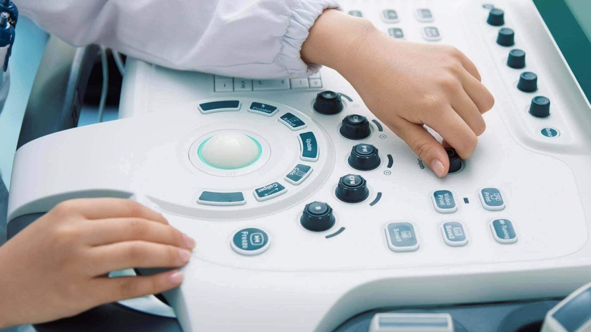 A Child Is Using An Ultrasound Machine