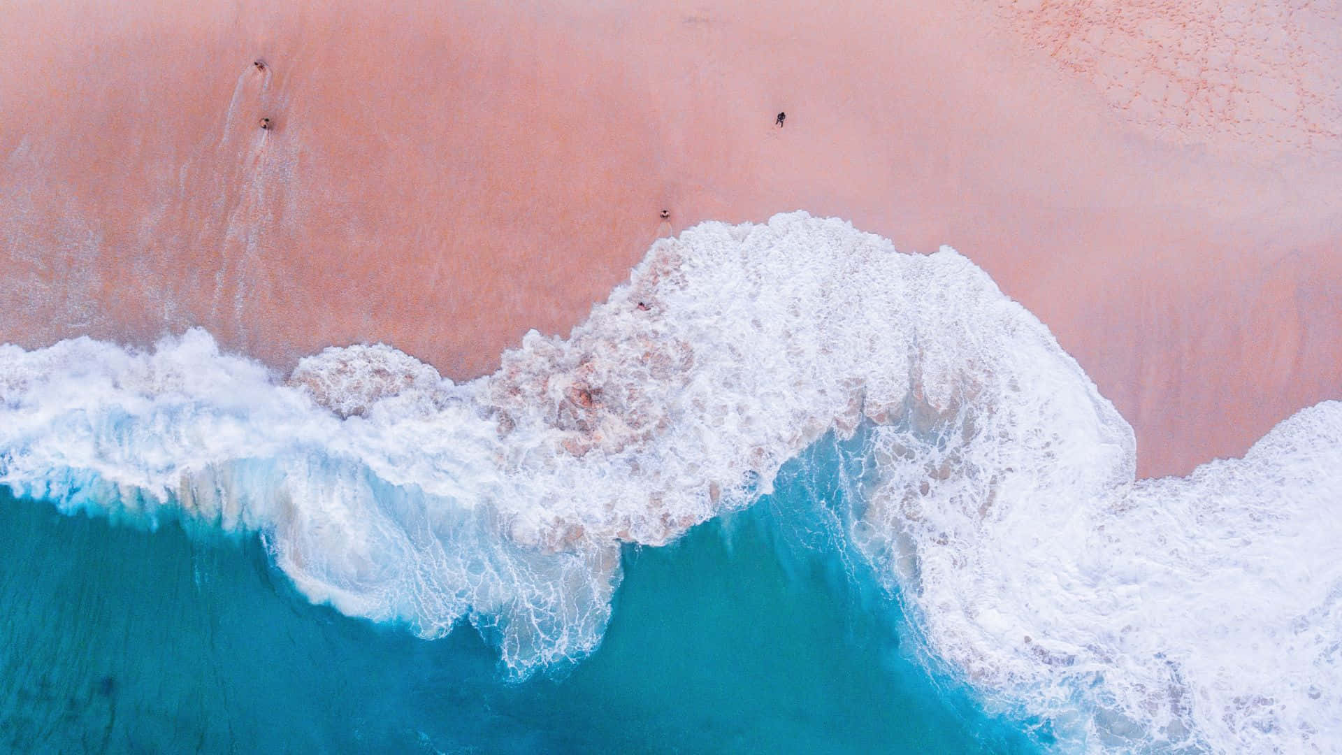 Unavista Impresionante De La Playa Rosa En El Paraíso. Fondo de pantalla