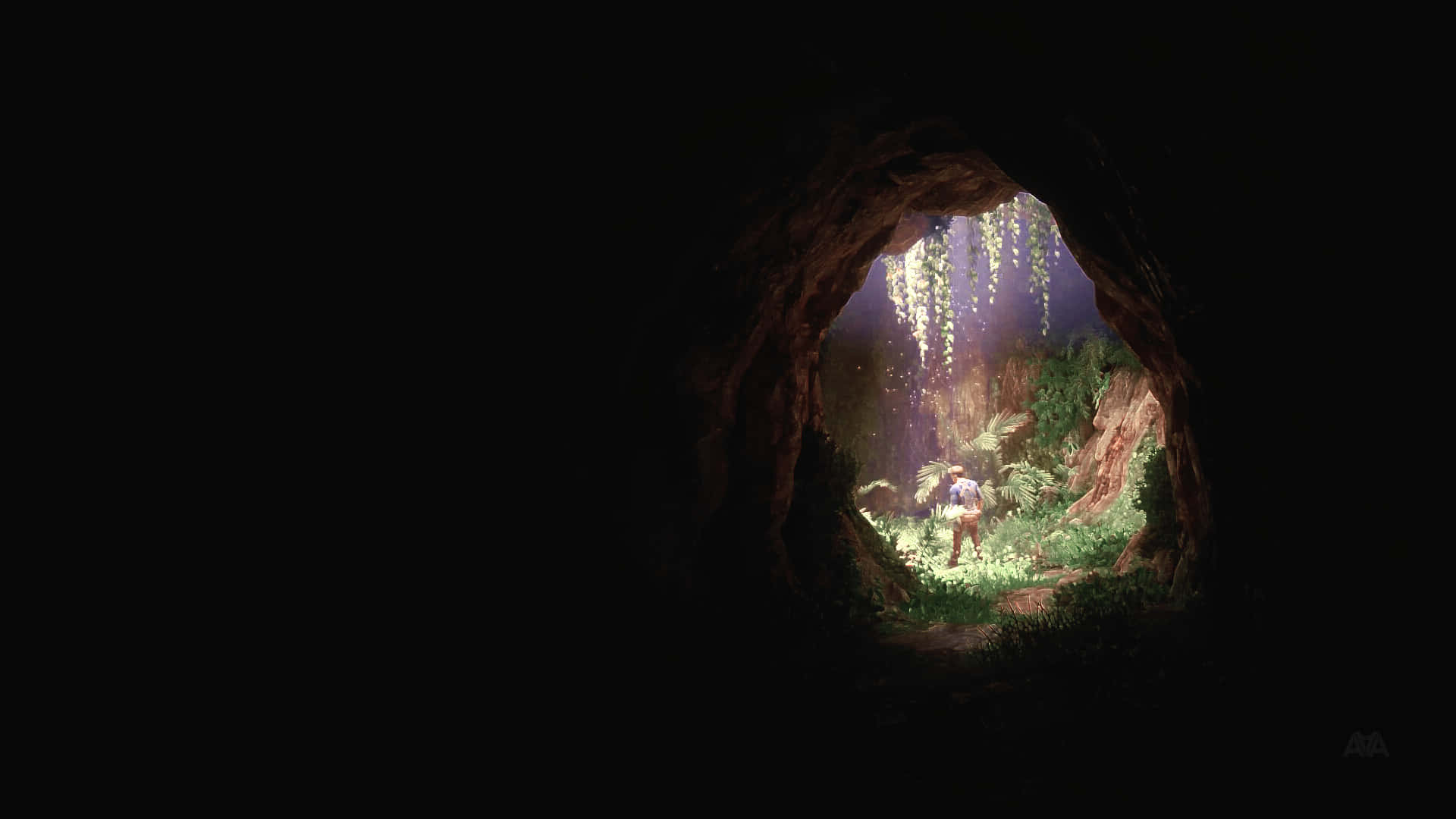 En mand står i en hule med et lys, der skinner på ham. Wallpaper