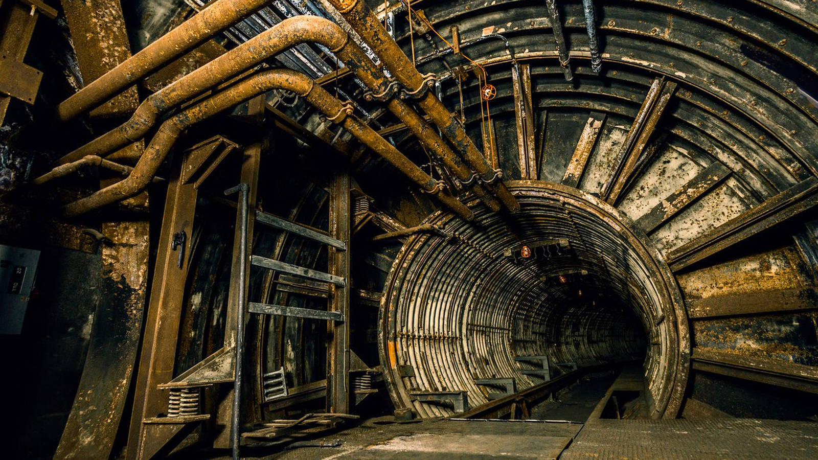 Underground Industrial Pipe In Tunnel Wallpaper