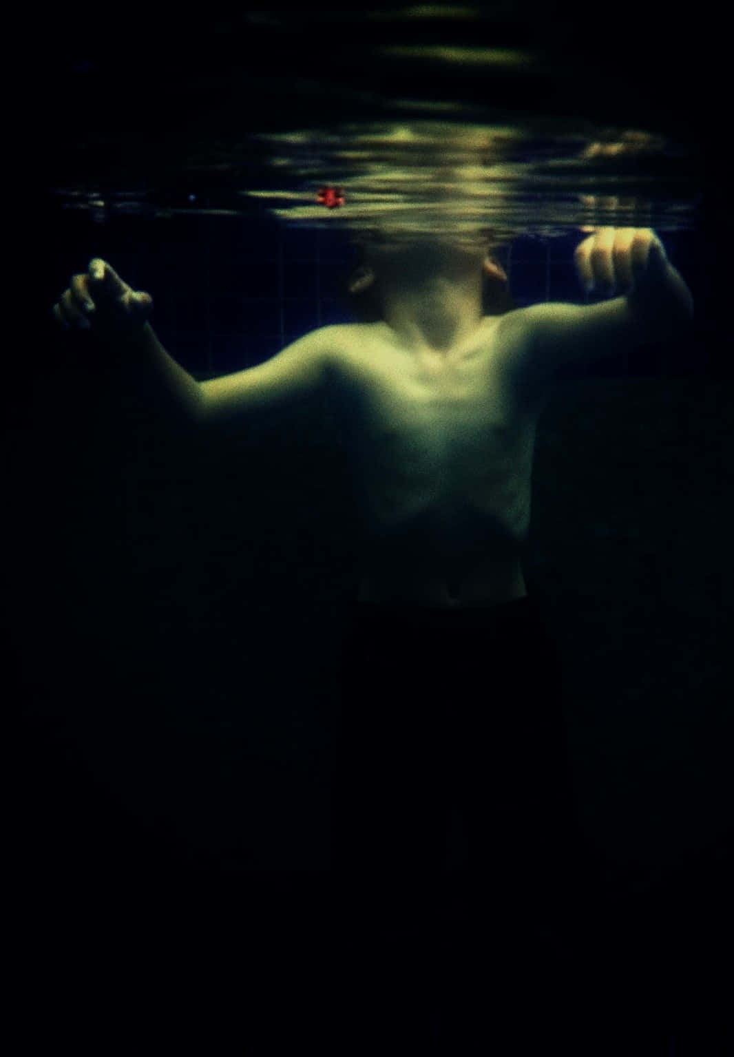 Boy Swimming Underwater Iphone Wallpaper