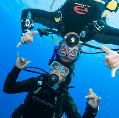 Underwater_ Scuba_ Divers_ Giving_ O K_ Signs PNG