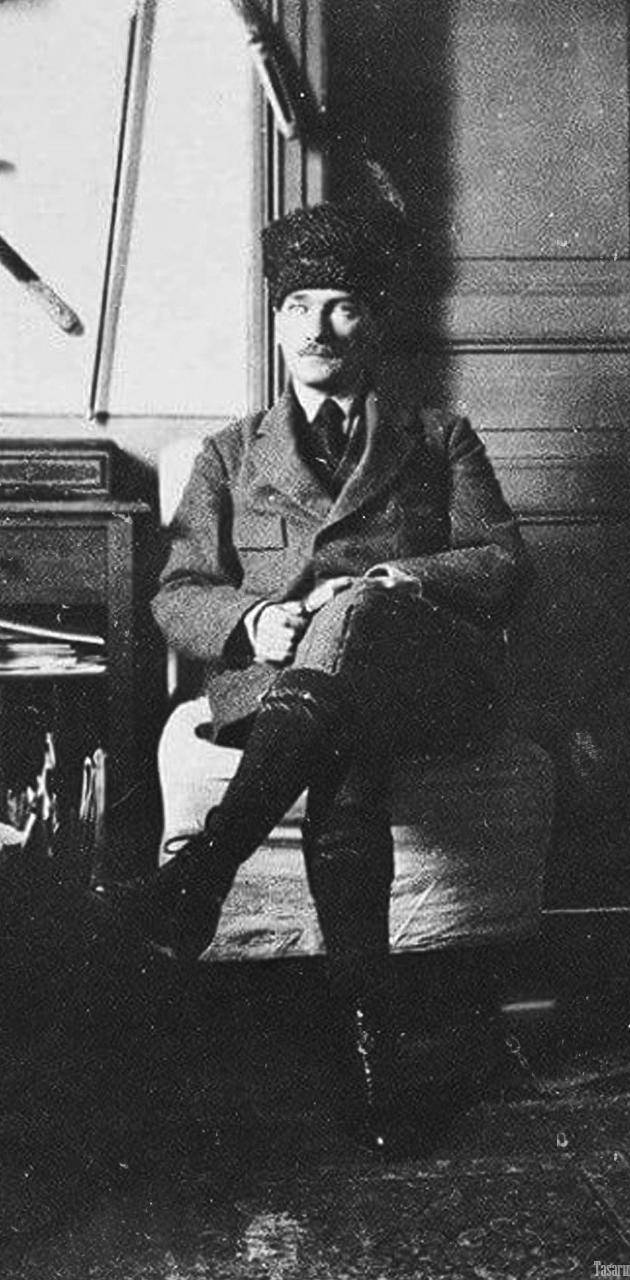 Uniformed Ataturk Sitting In Room Wallpaper