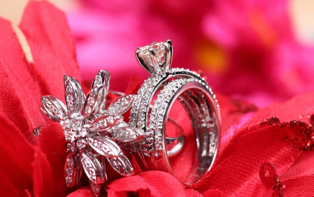 Download Unique Diamond Engagement Couple Rings Wallpaper 