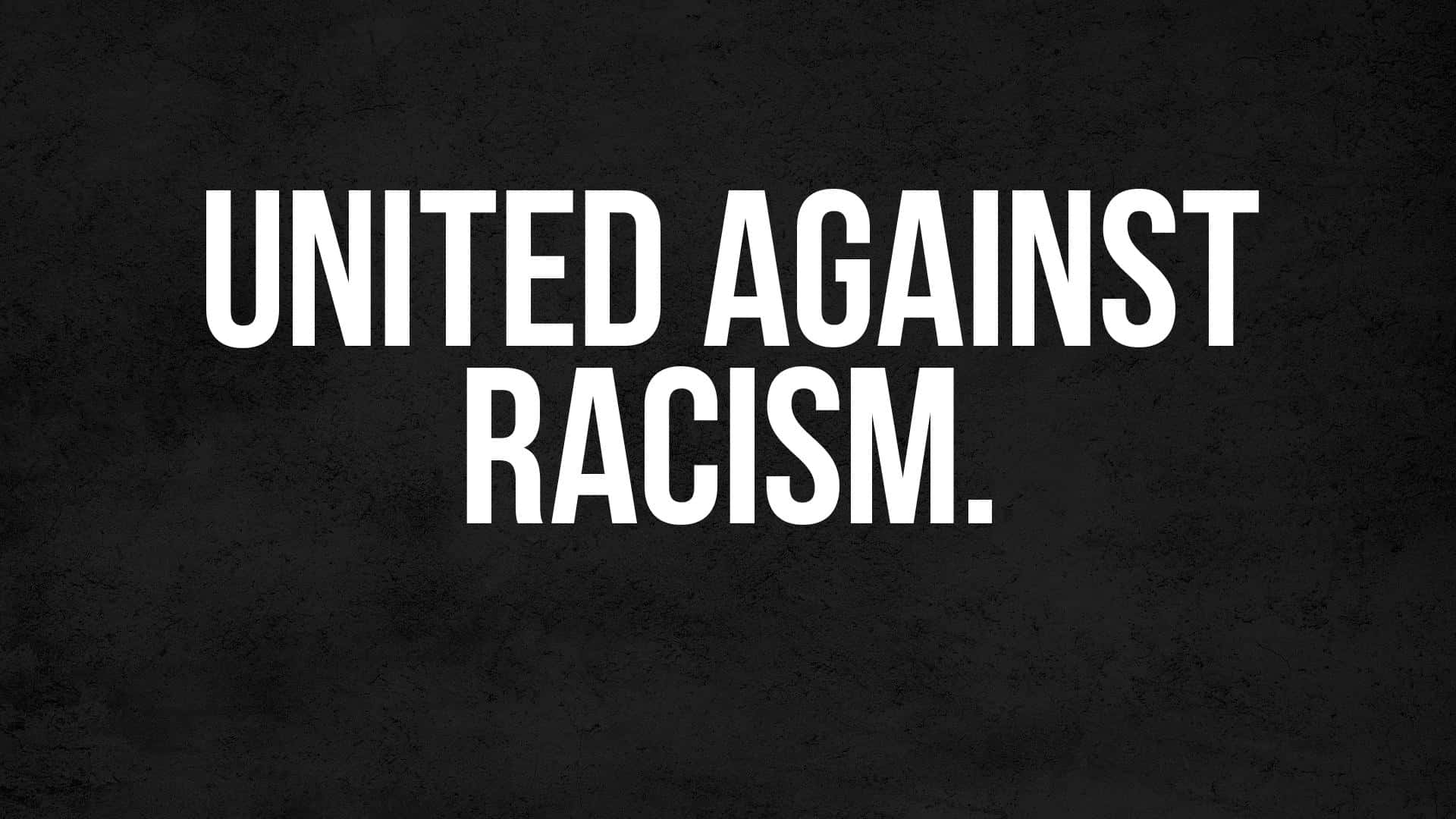 United Against Racism In Capital Letters Wallpaper