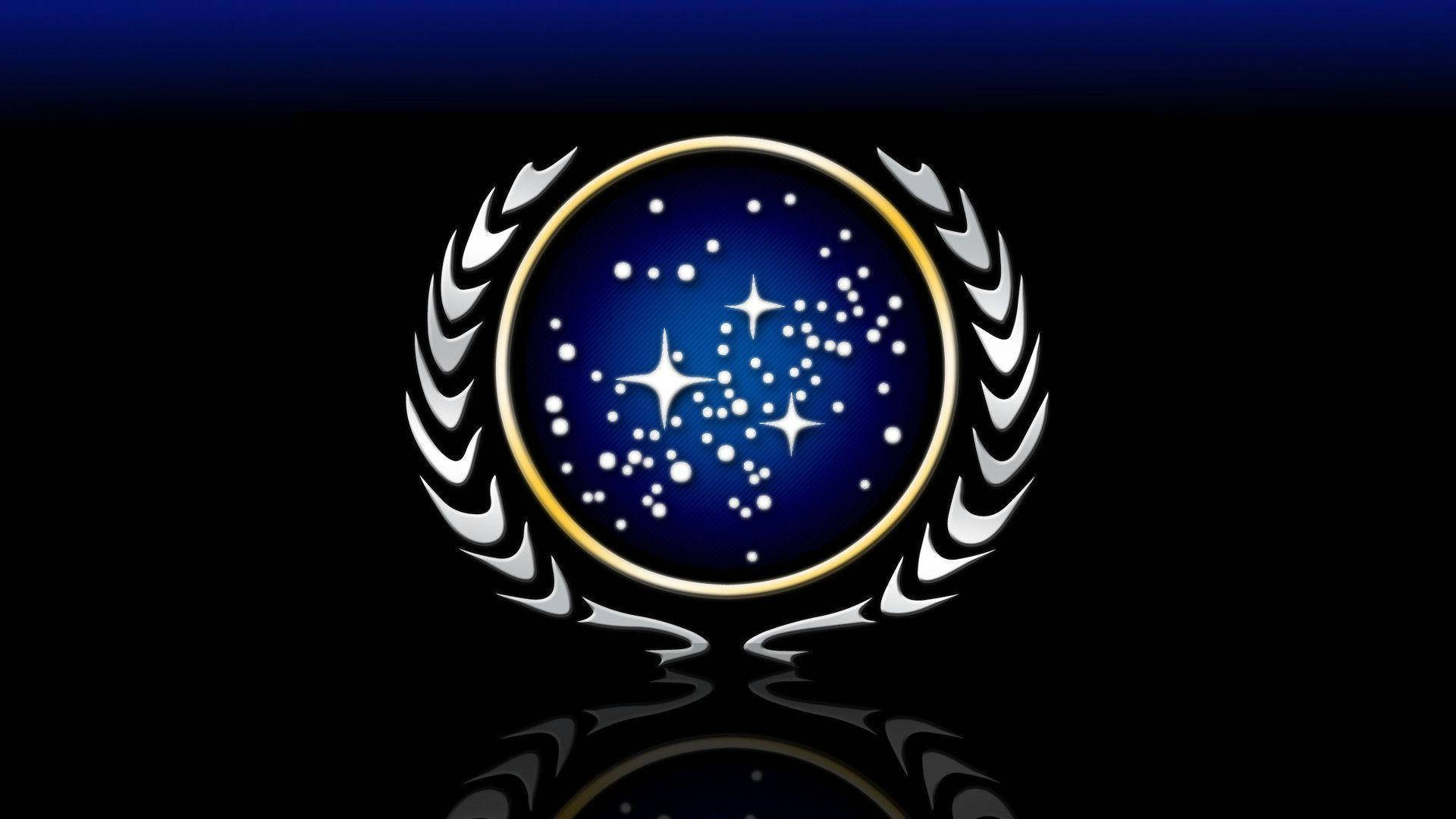 Star Trek wallpaper of The United Federation of Planets logo. 