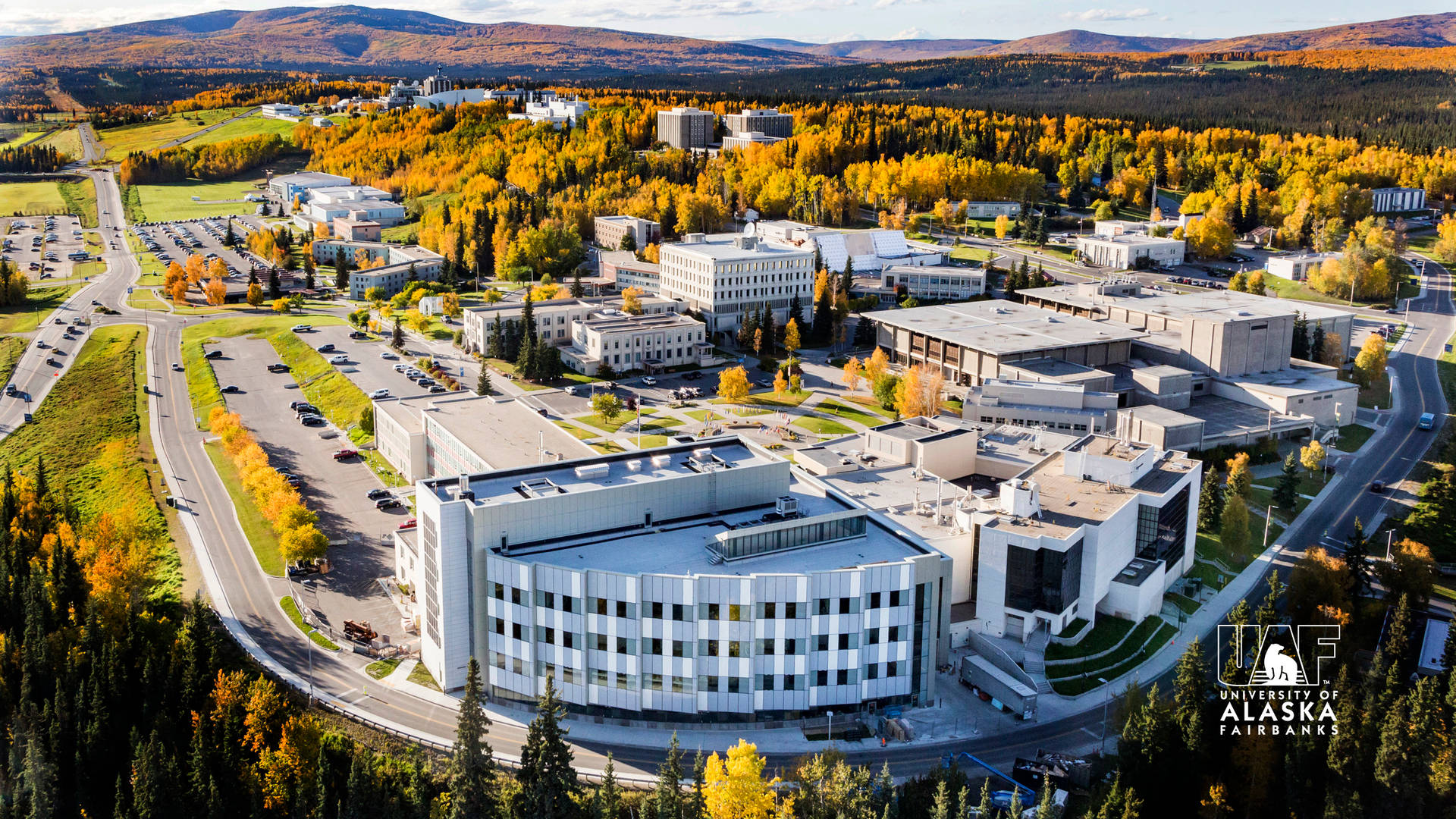 Posterde La Escuela De La Universidad De Alaska Fairbanks Fondo de pantalla