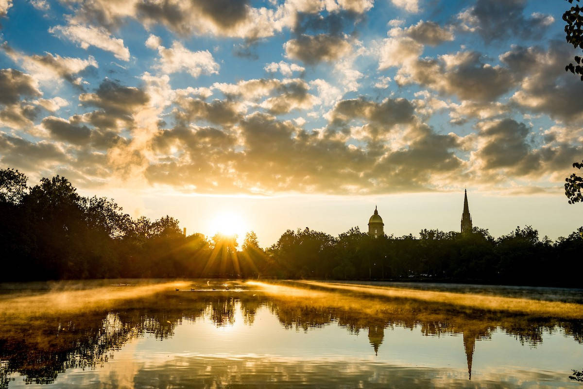 University Of Notre Dame Lake During Sunset Wallpaper