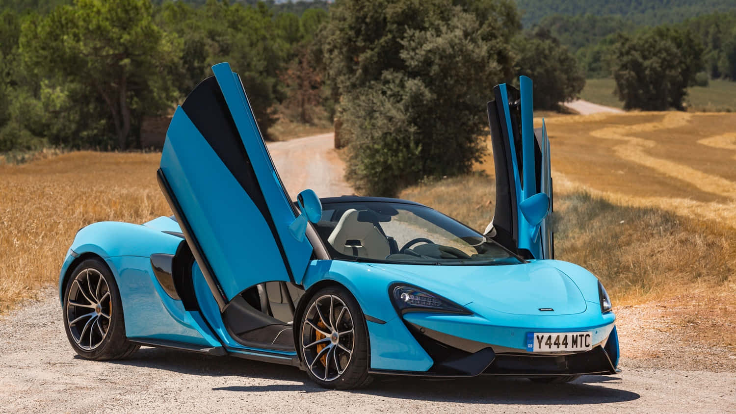 Unleash The Beast - Mclaren 570s In Action Wallpaper