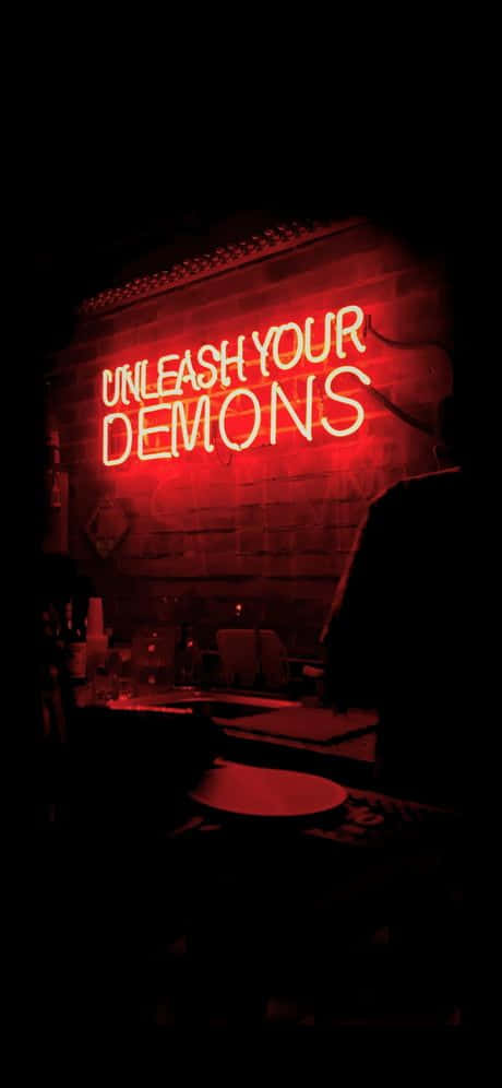 Unleash Your Demons Neon Sign Wallpaper