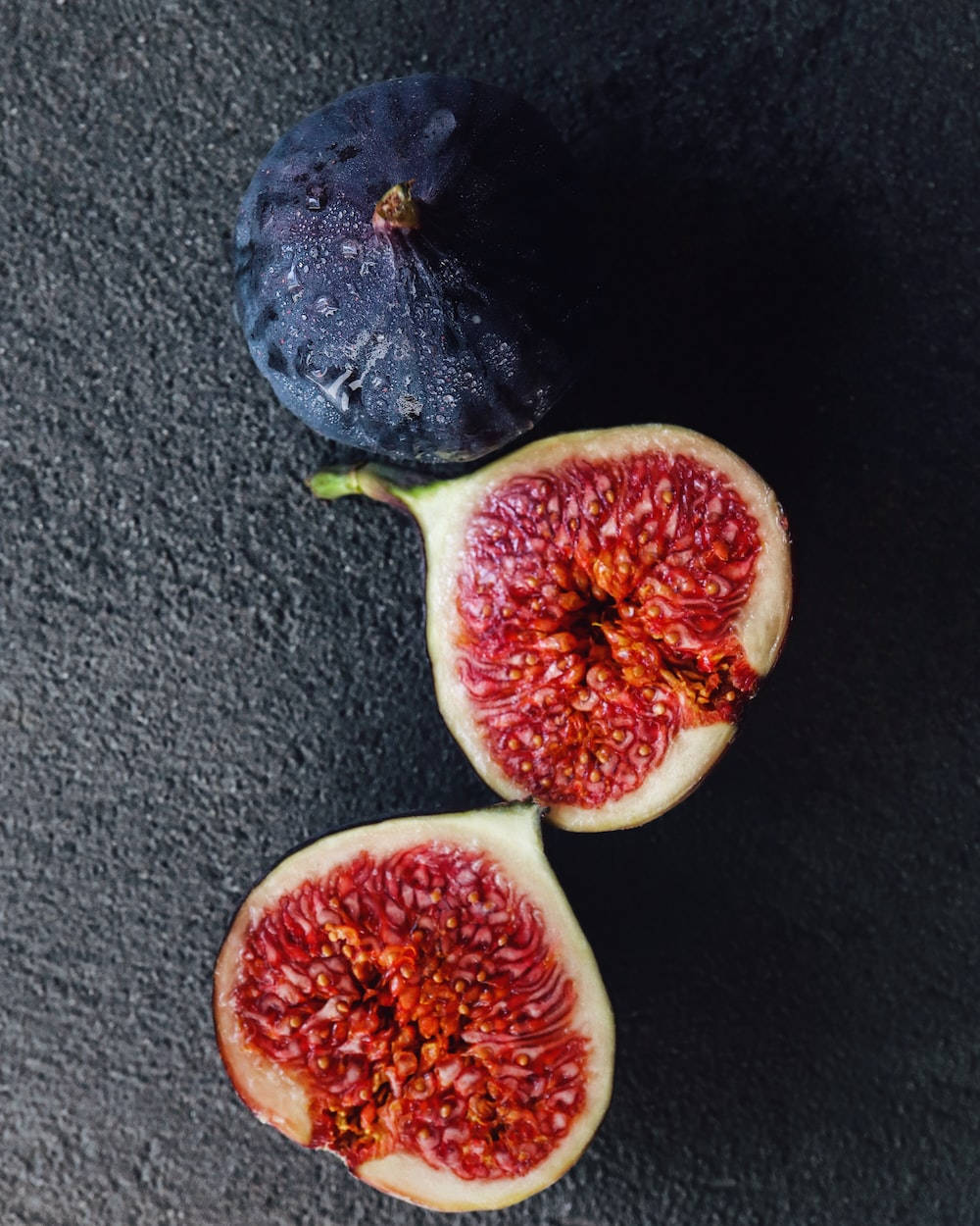 Unopened And Sliced Ripe Fig Fruits Wallpaper