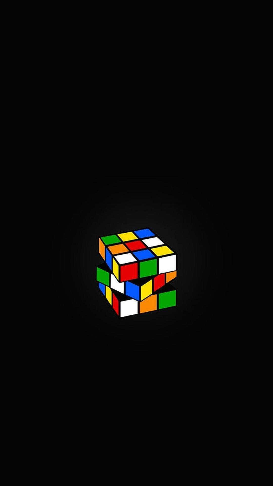 Unsolved Rubiks Cubeon Black Background Wallpaper