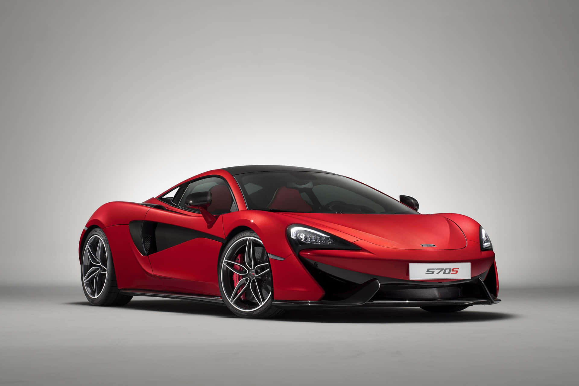 Avdekker Kraften Og Elegansen Til Mclaren 570s Bakgrunnsbildet