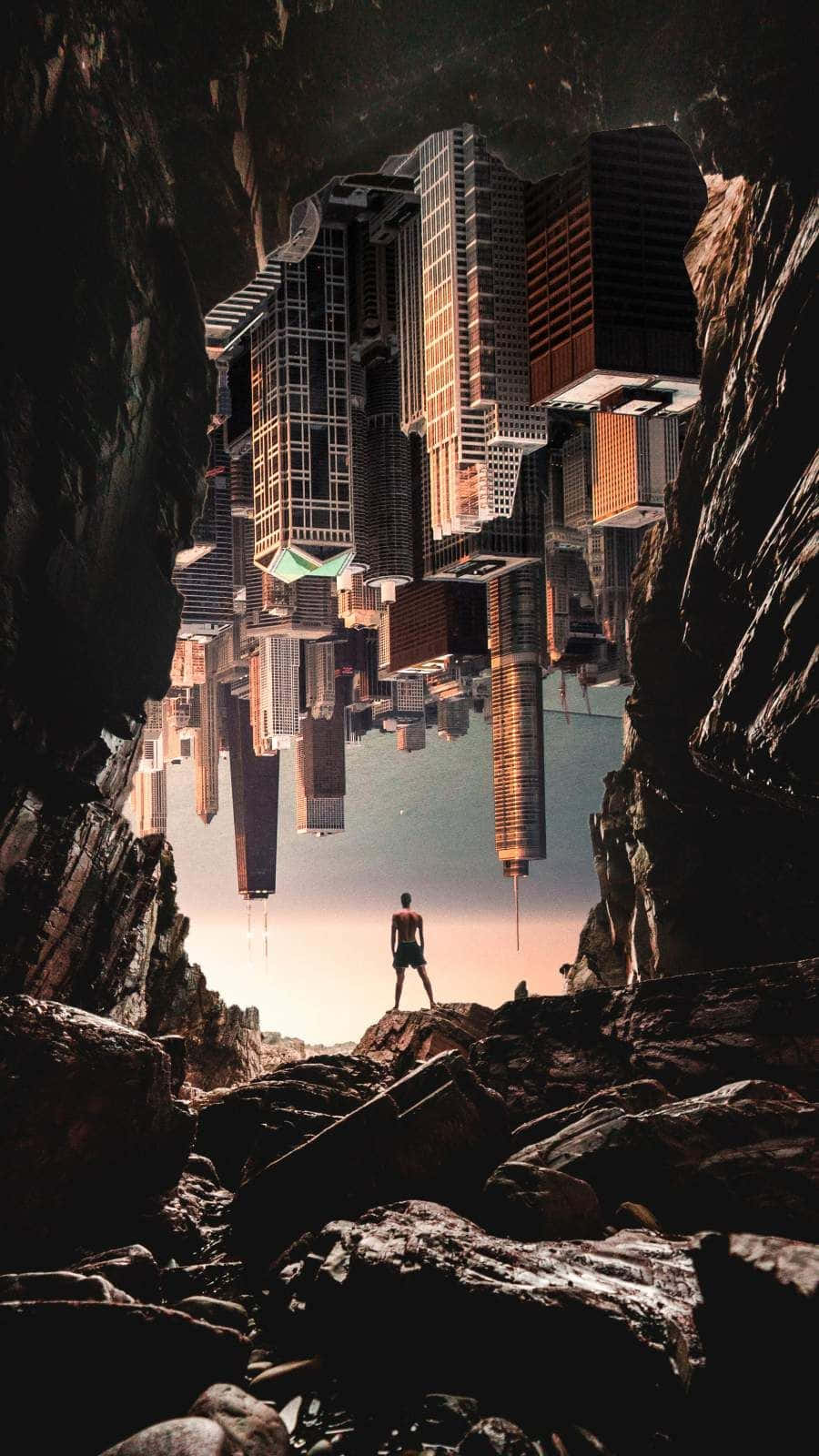 A Man Standing In A Cave With A City In The Background