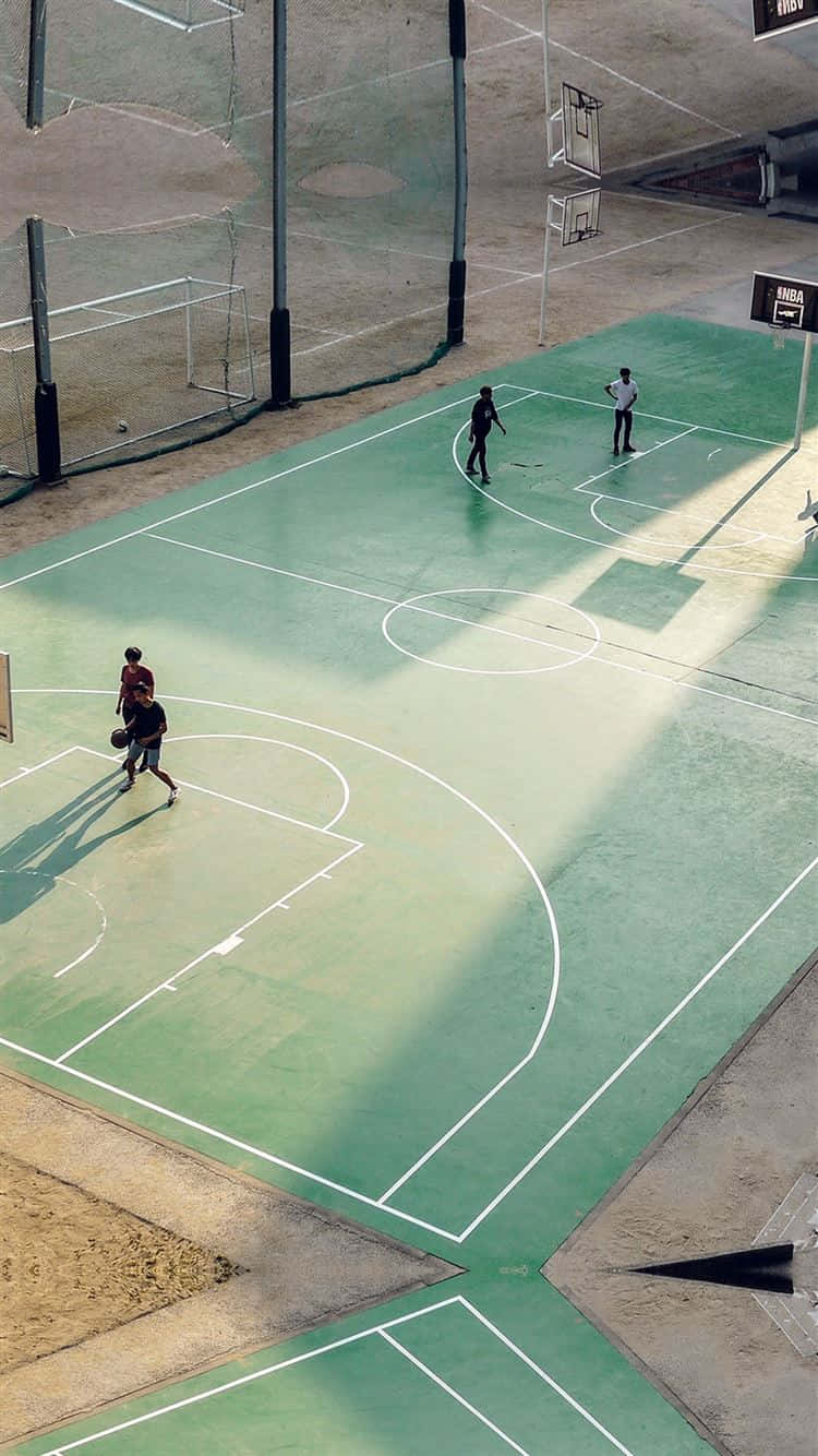 Urban Basketball Court Game Action Wallpaper