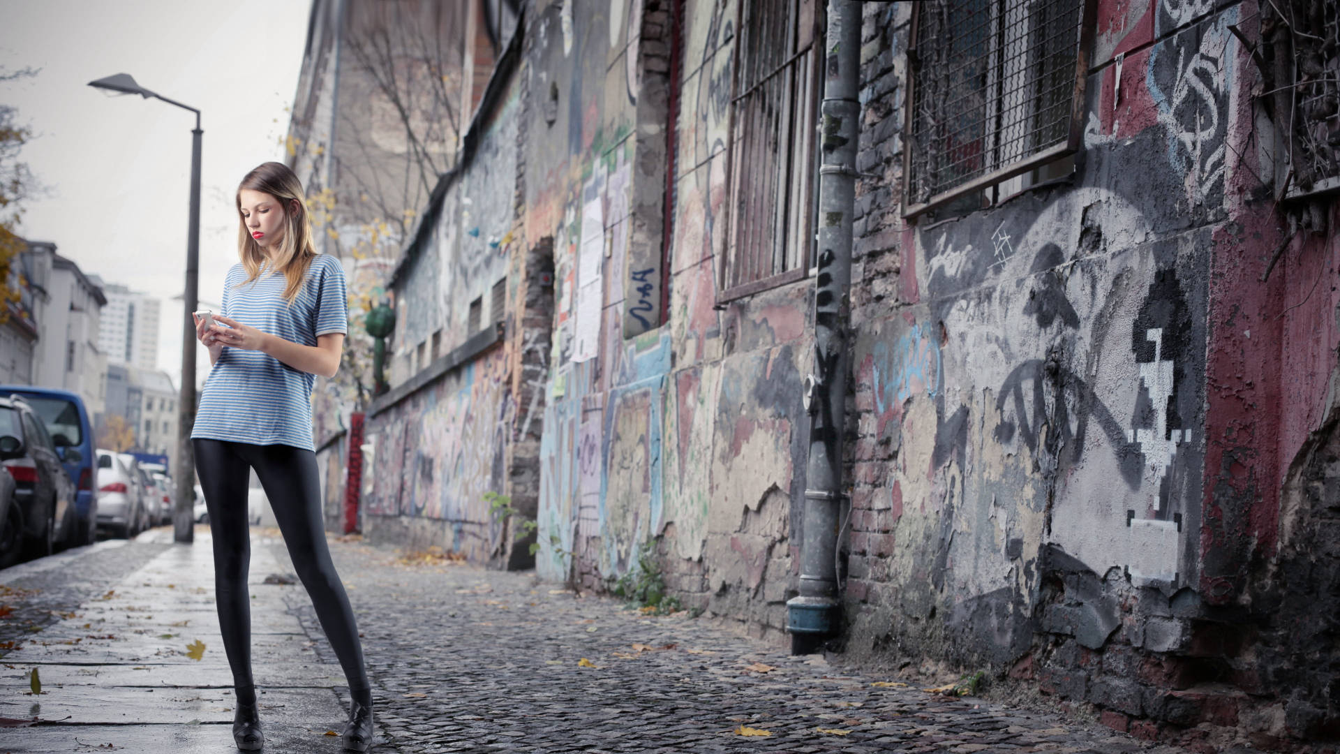 Urban Girl Alone Standing On A Street Wallpaper