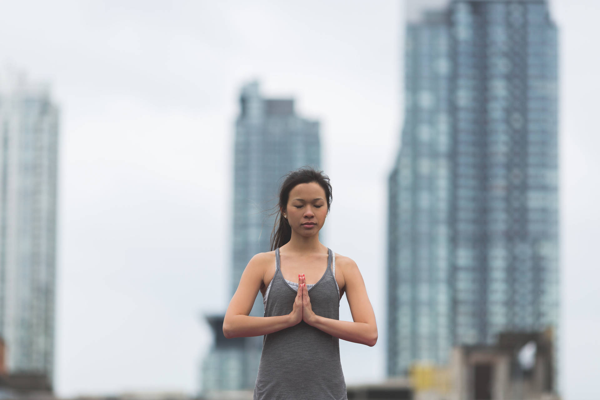 Embracing Serenity: Urban Living Meditation Wallpaper