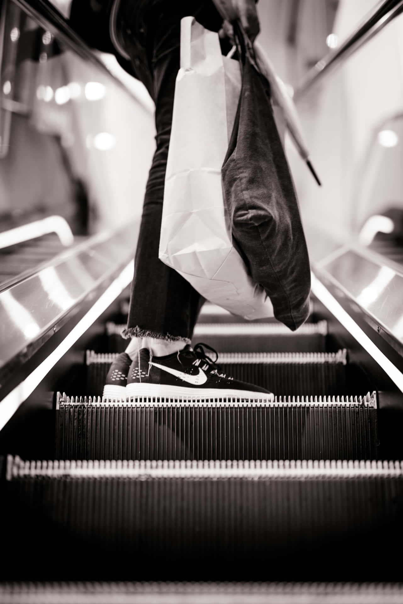 Urban Shopping Escalator Moment Wallpaper