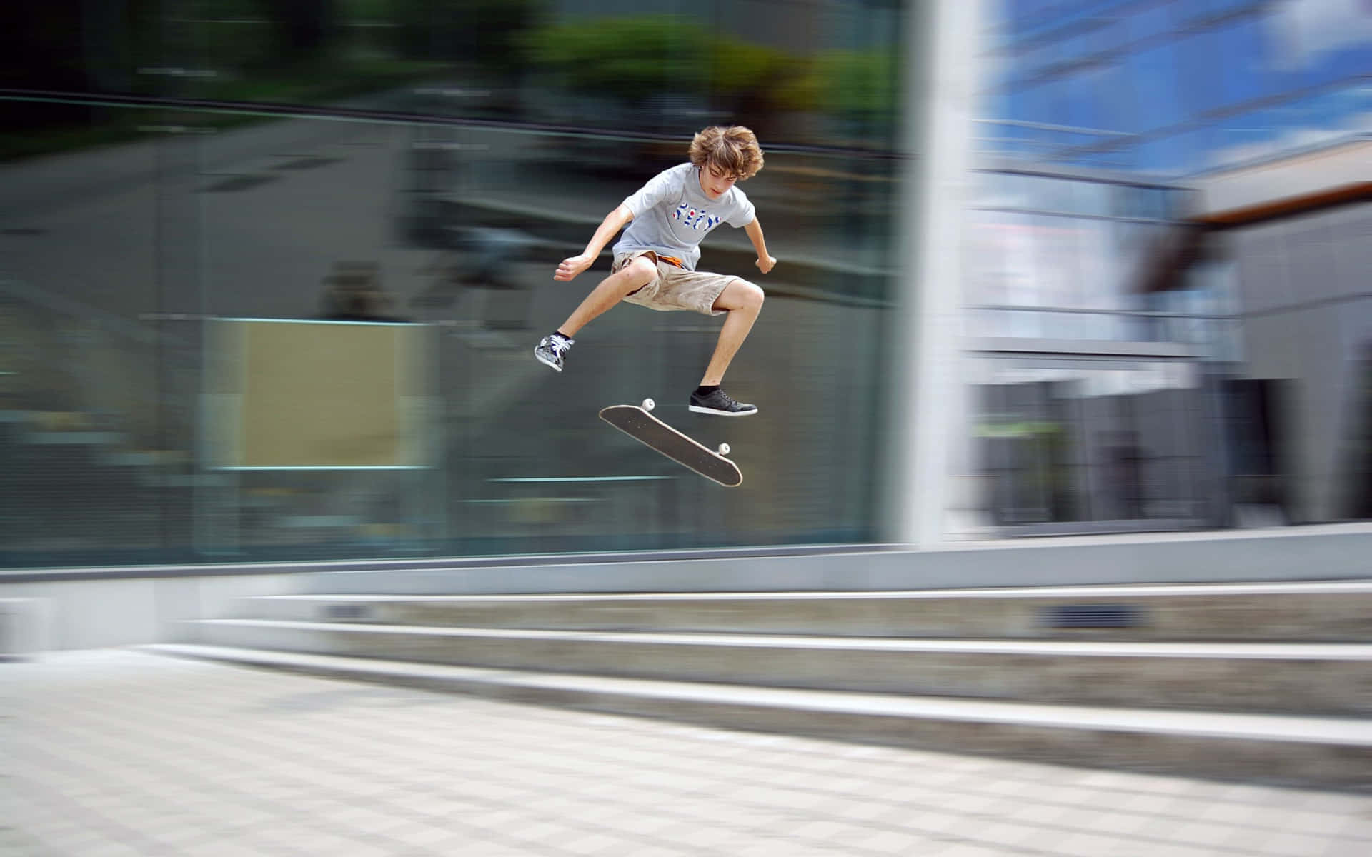 Urban Skateboard Jump Motion Blur Wallpaper