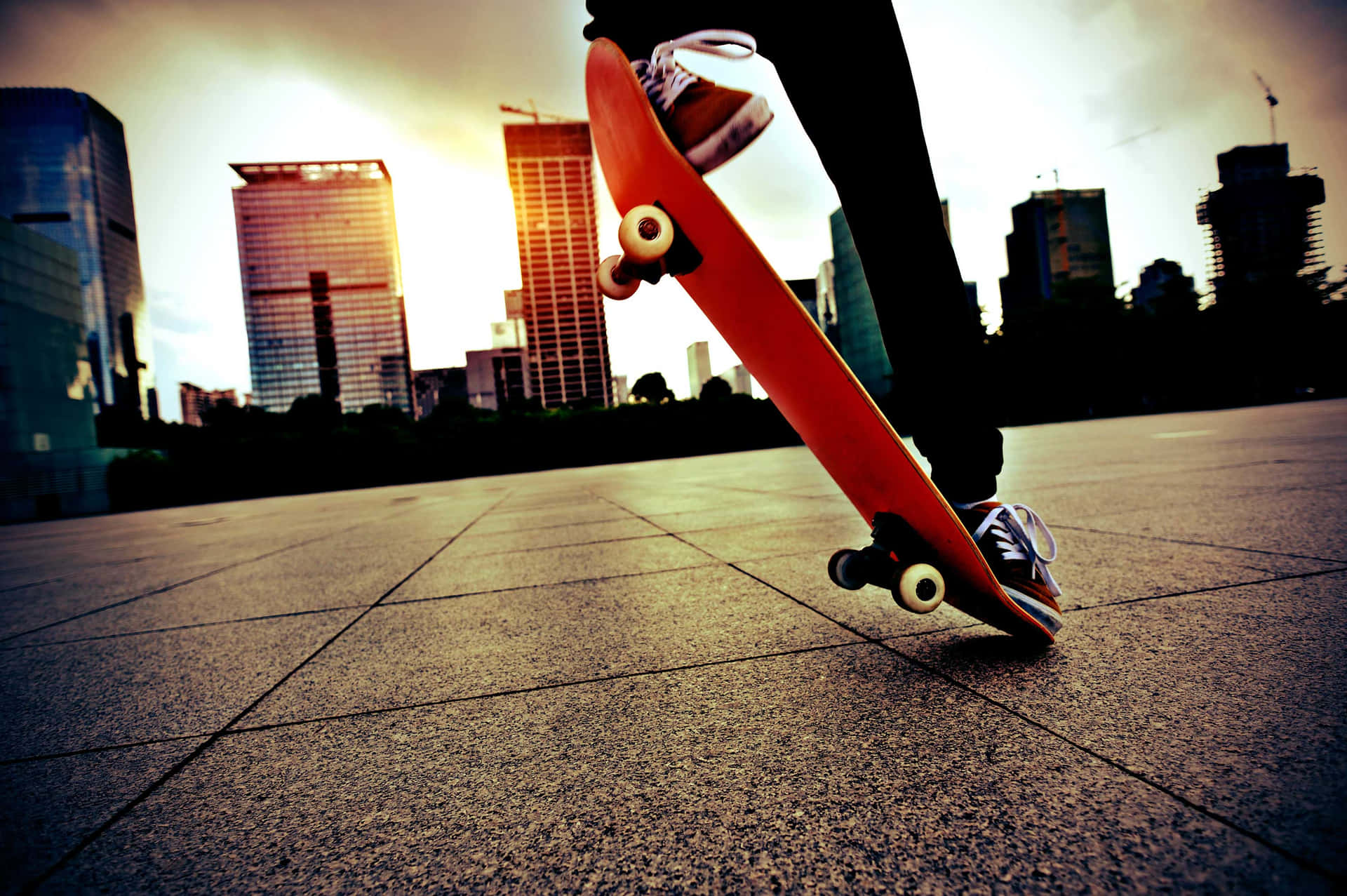 Urban Skateboarding Trick Sunset Wallpaper