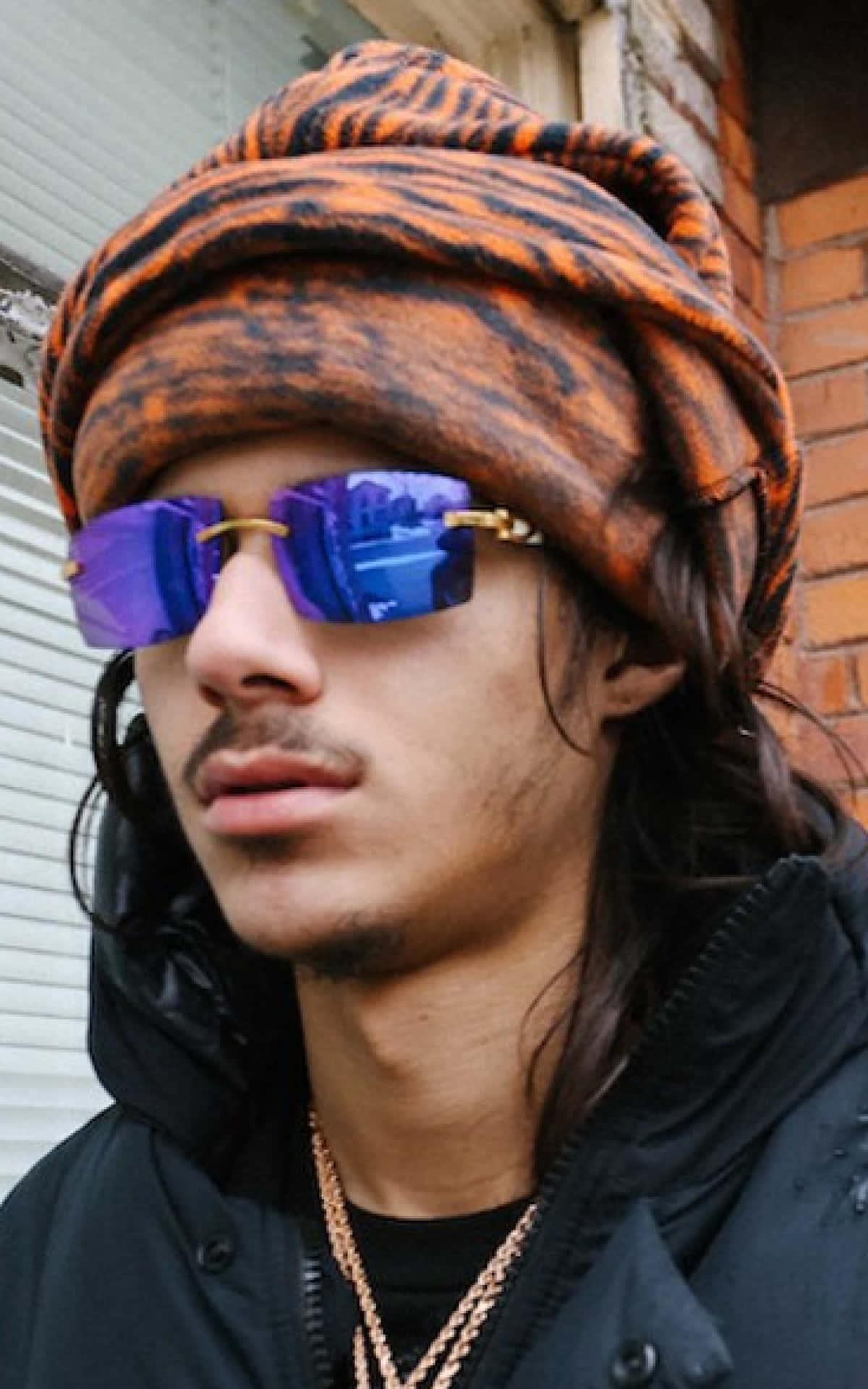 Urban Style Portrait Man With Turbanand Sunglasses Wallpaper