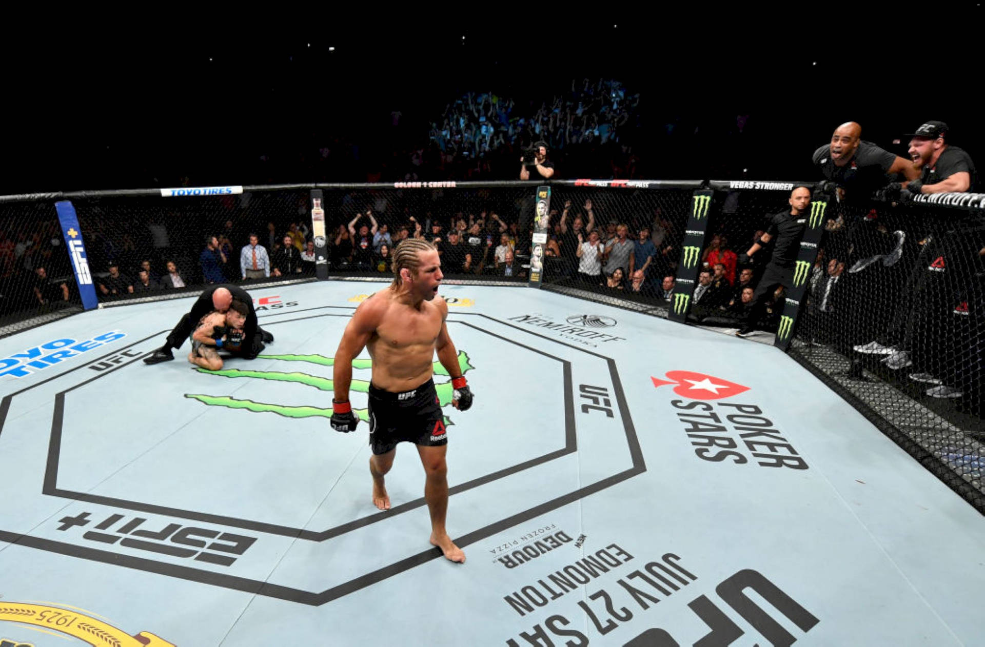 Urijah Faber In The Octagon Ring Wallpaper