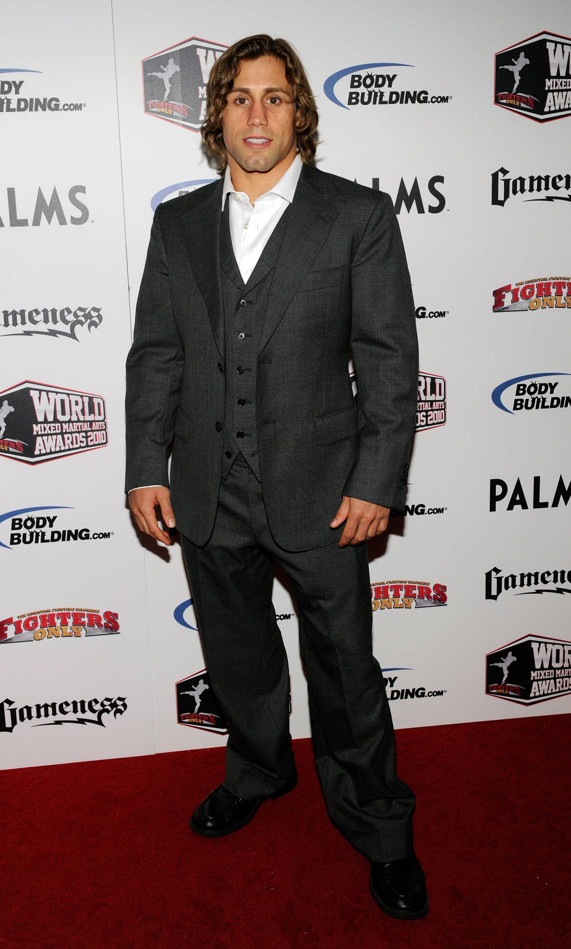 Urijah Faber flaunting his charismatic aura on the Red Carpet Wallpaper