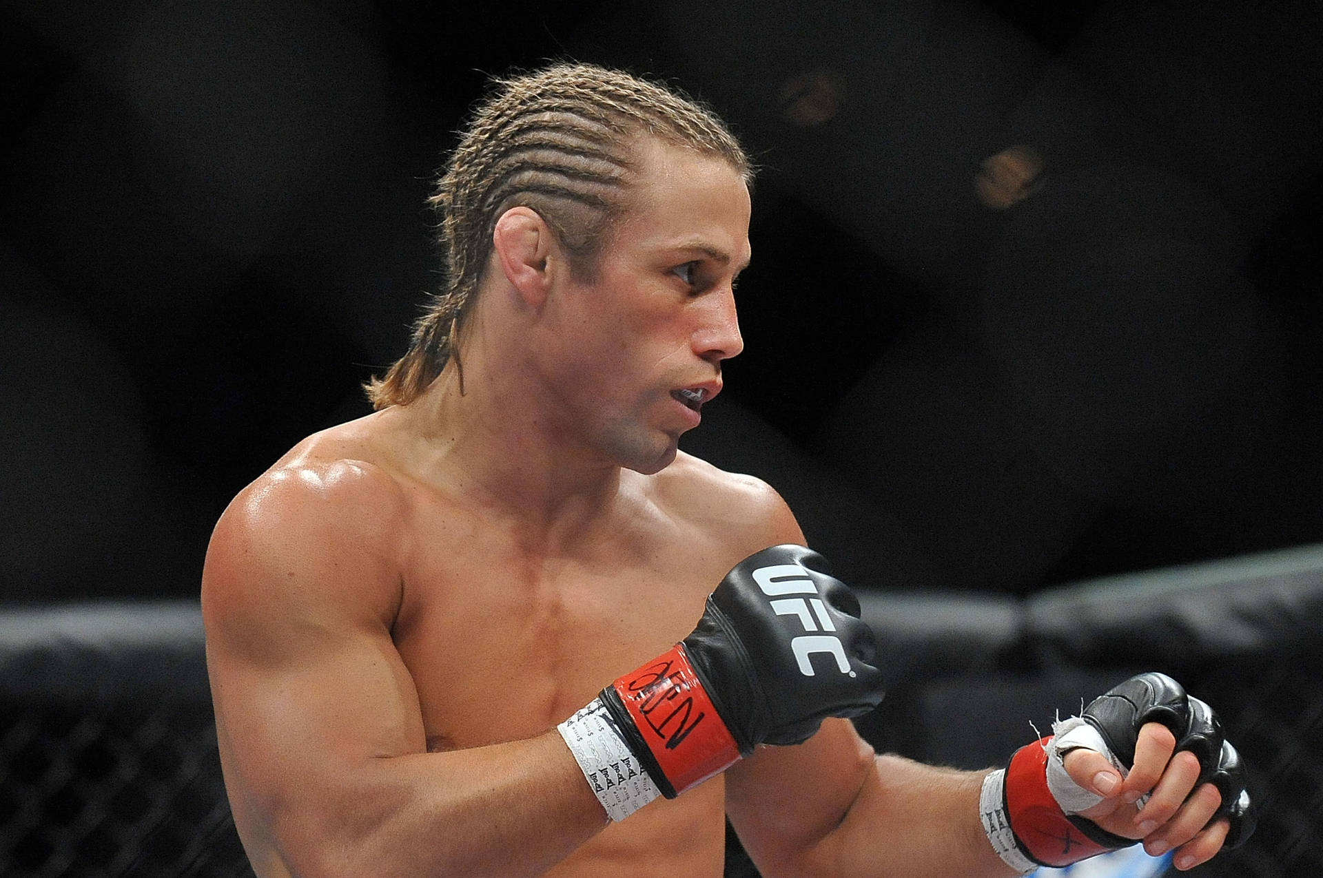 Download Urijah Faber Ready To Fight Wallpaper | Wallpapers.com