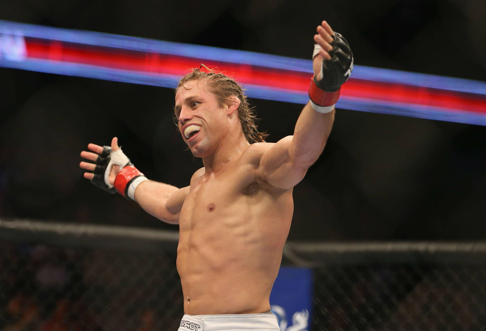 Urijah Faber With Arms Open Wide Wallpaper