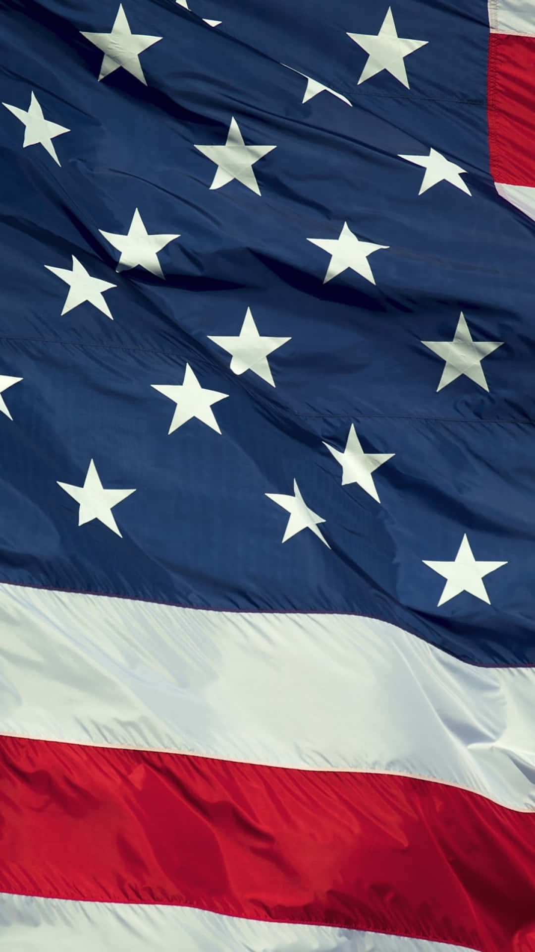 Unoslogan Patriottico Con La Bandiera Americana In Primo Piano Sfondo