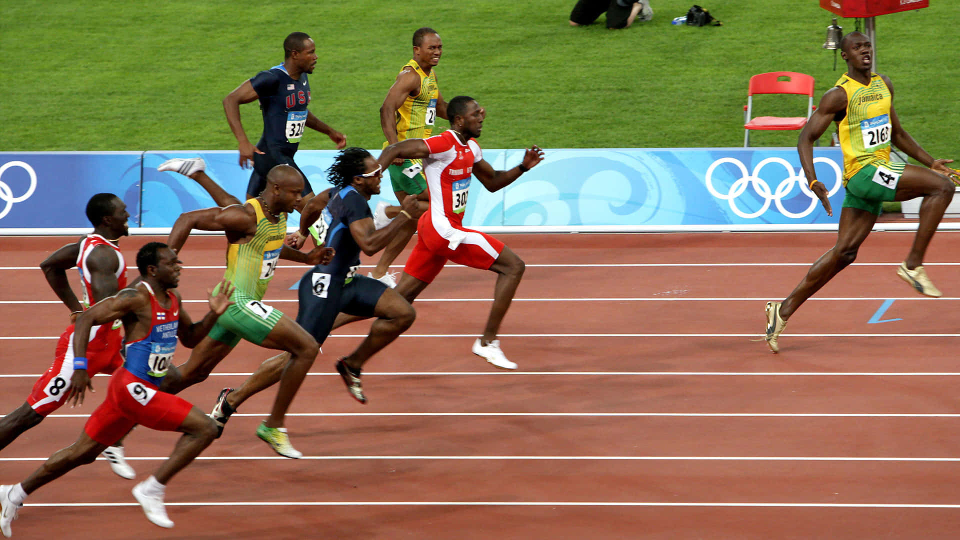 Usain Bolt Dashing Ahead Of Competition Wallpaper