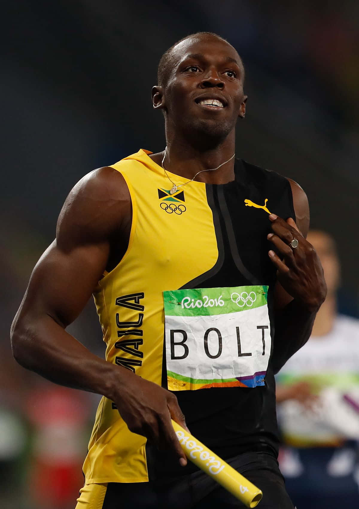 Usain Bolt In Black Yellow Shirt Wallpaper