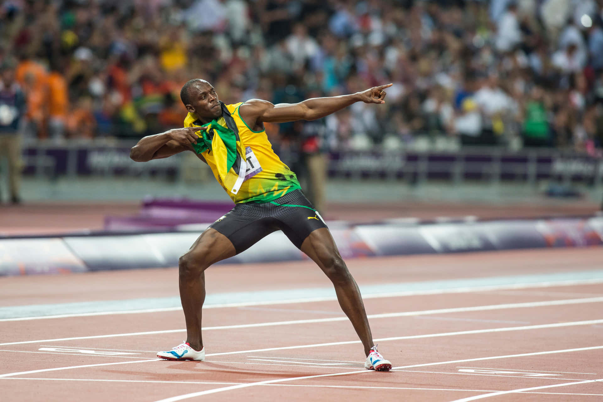 Usain Bolt In Yellow Doing Pose Wallpaper