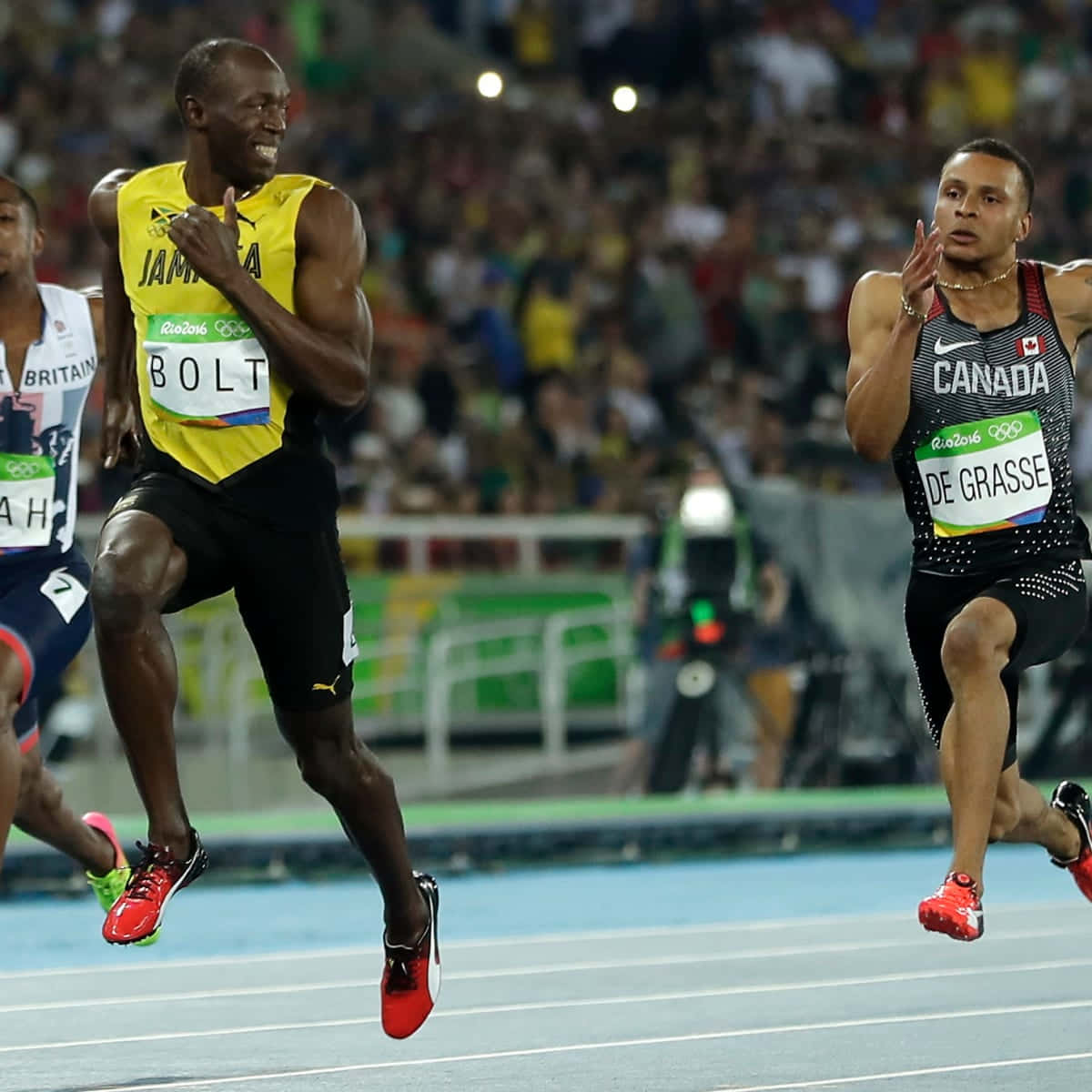 Usain Bolt Looking Back At Competitors Wallpaper