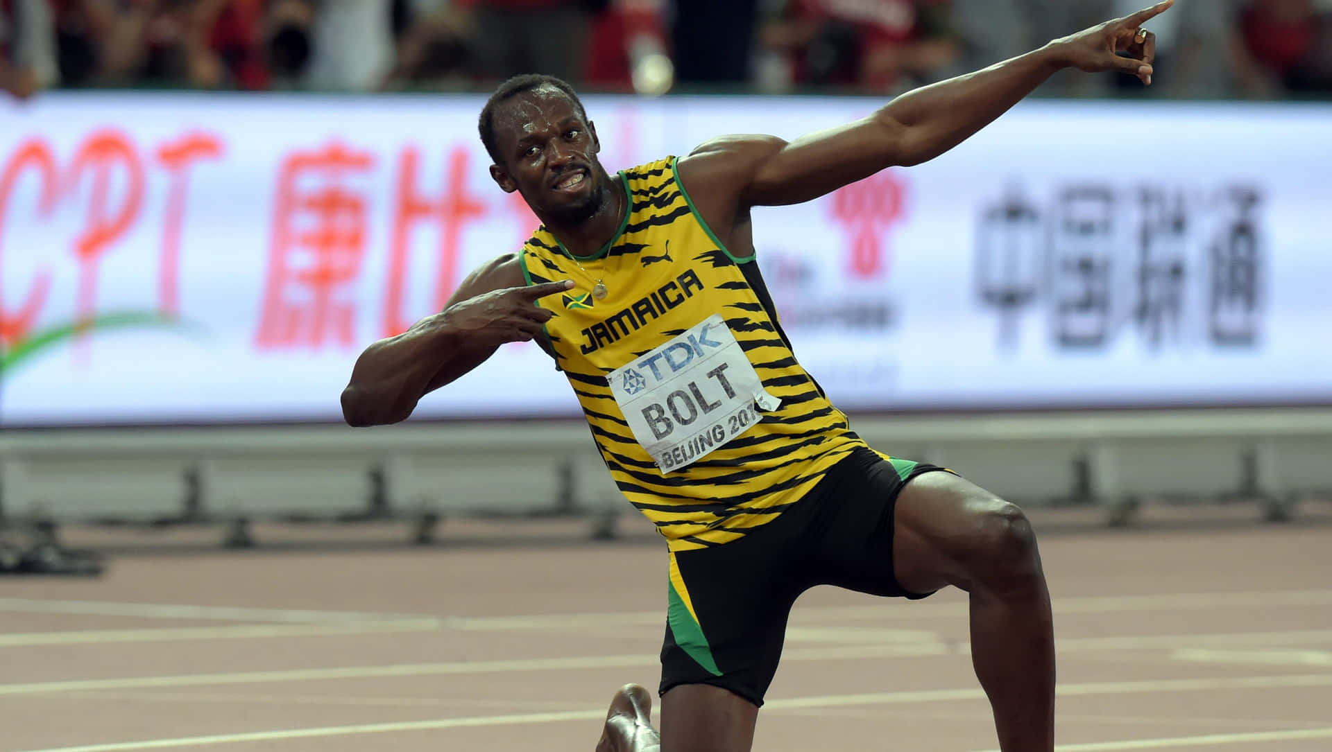 Usain Bolt Pointing At The Sky Wallpaper