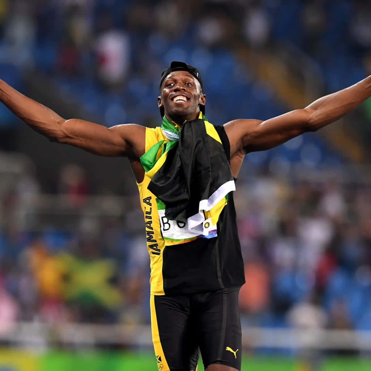 Usain Bolt Running And Cheering Wallpaper