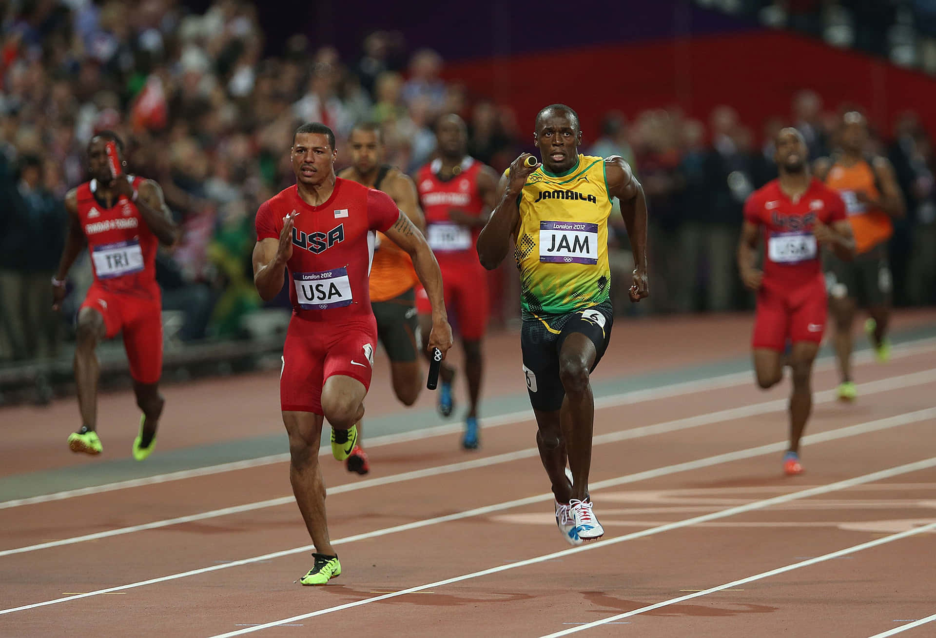 Usain Bolt løber i løb Skrivebords Tapet Wallpaper